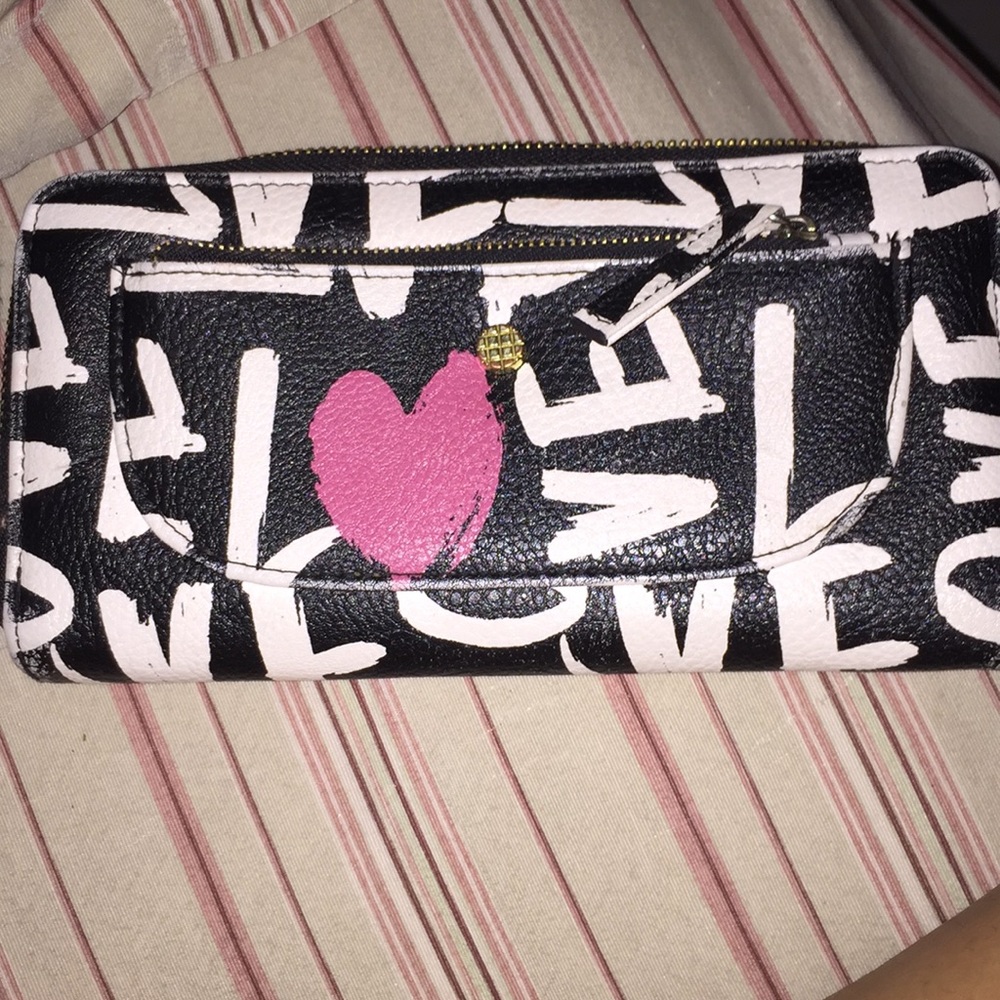 black wallet with white letters